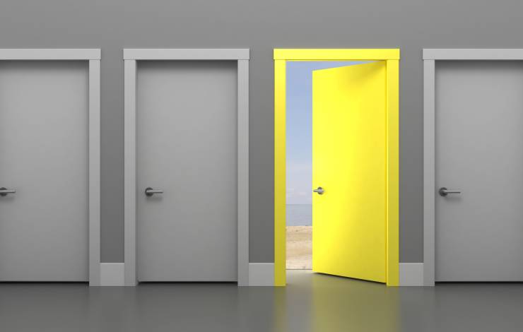 Yellow door open between gray doors