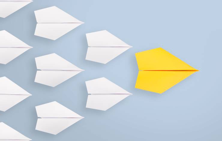 yellow paper airplane