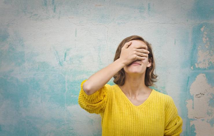 Woman embarrassed about mistake