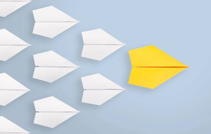 yellow paper airplane