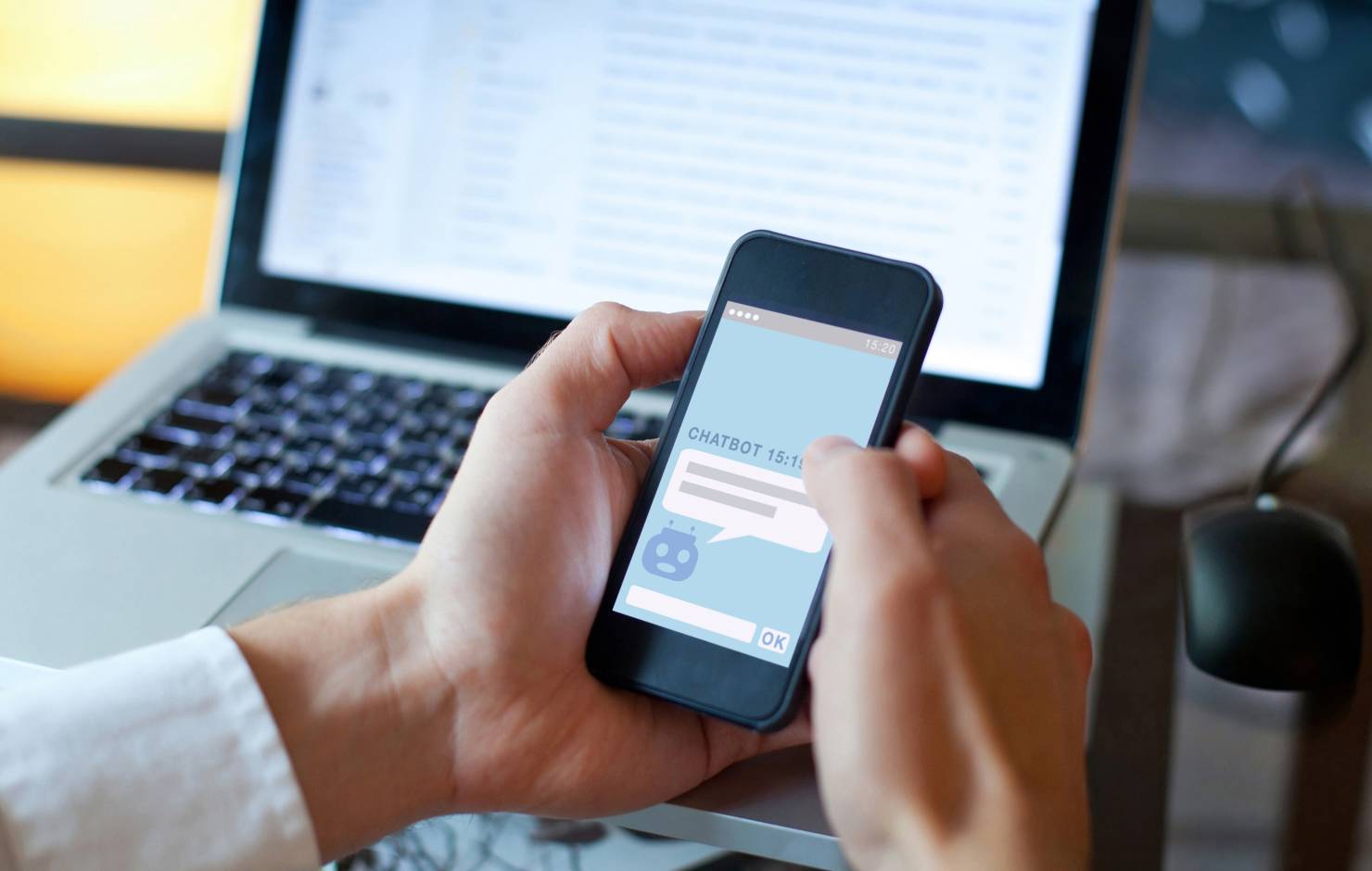 person using a chatbot on a smart phone