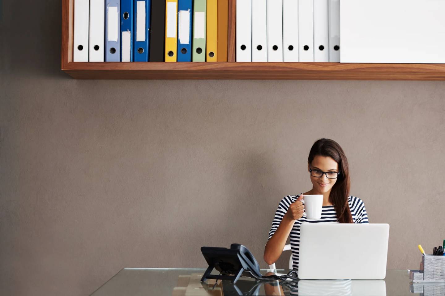 small business owner sitting at desk