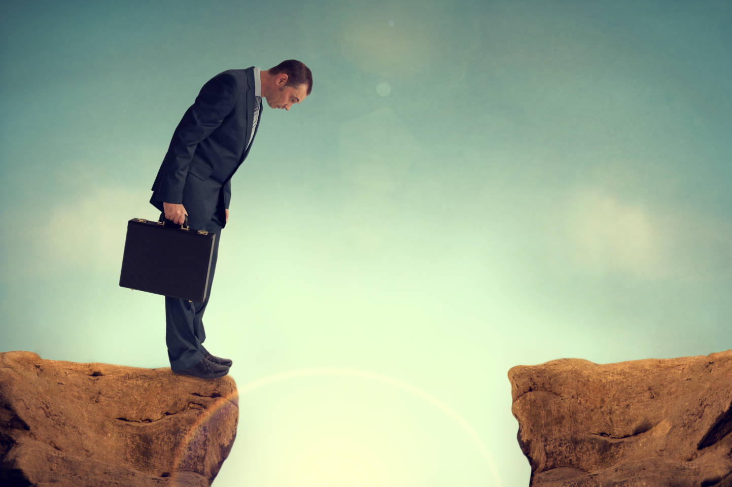 businessman looking at the gap