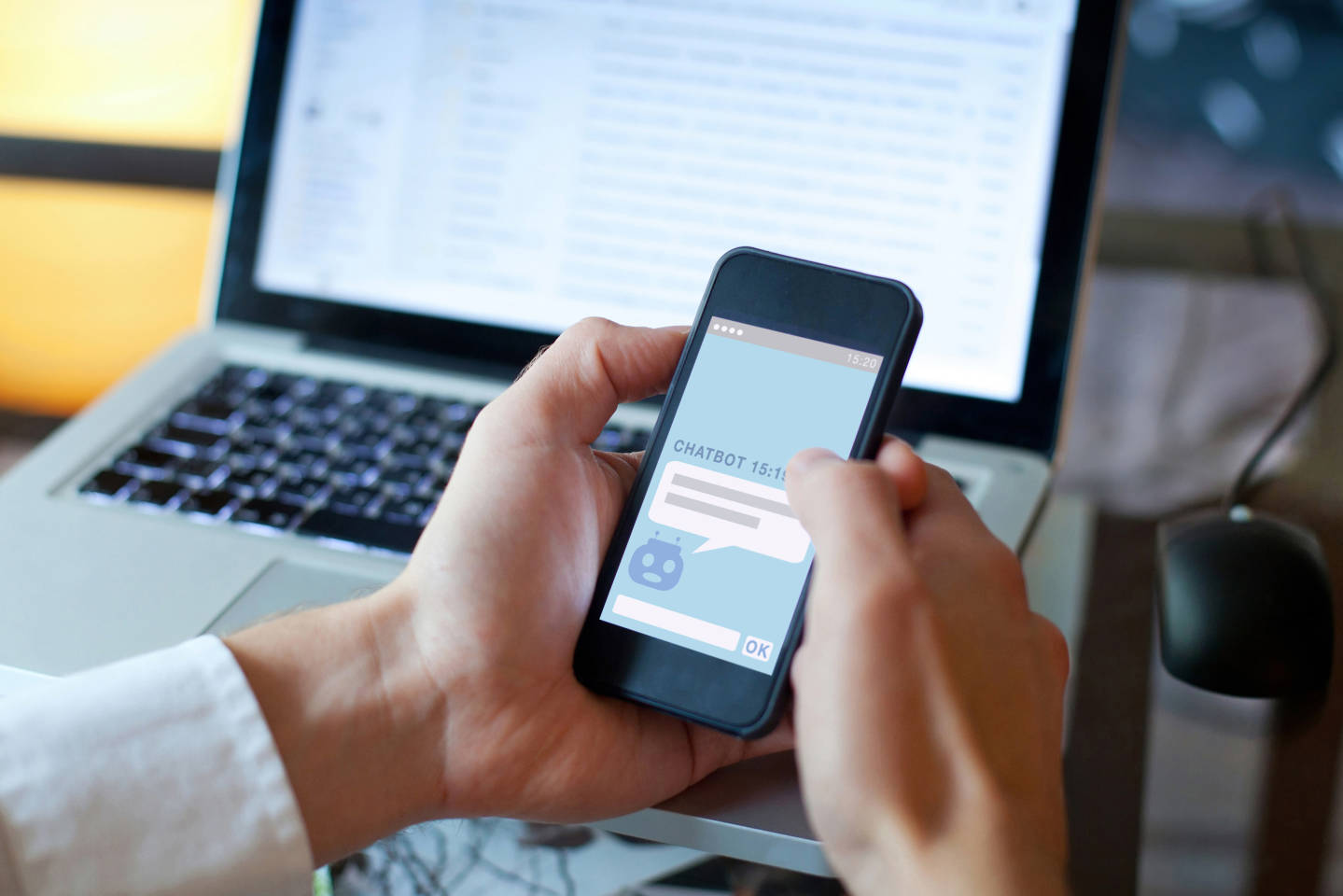 person using a chatbot on a smart phone