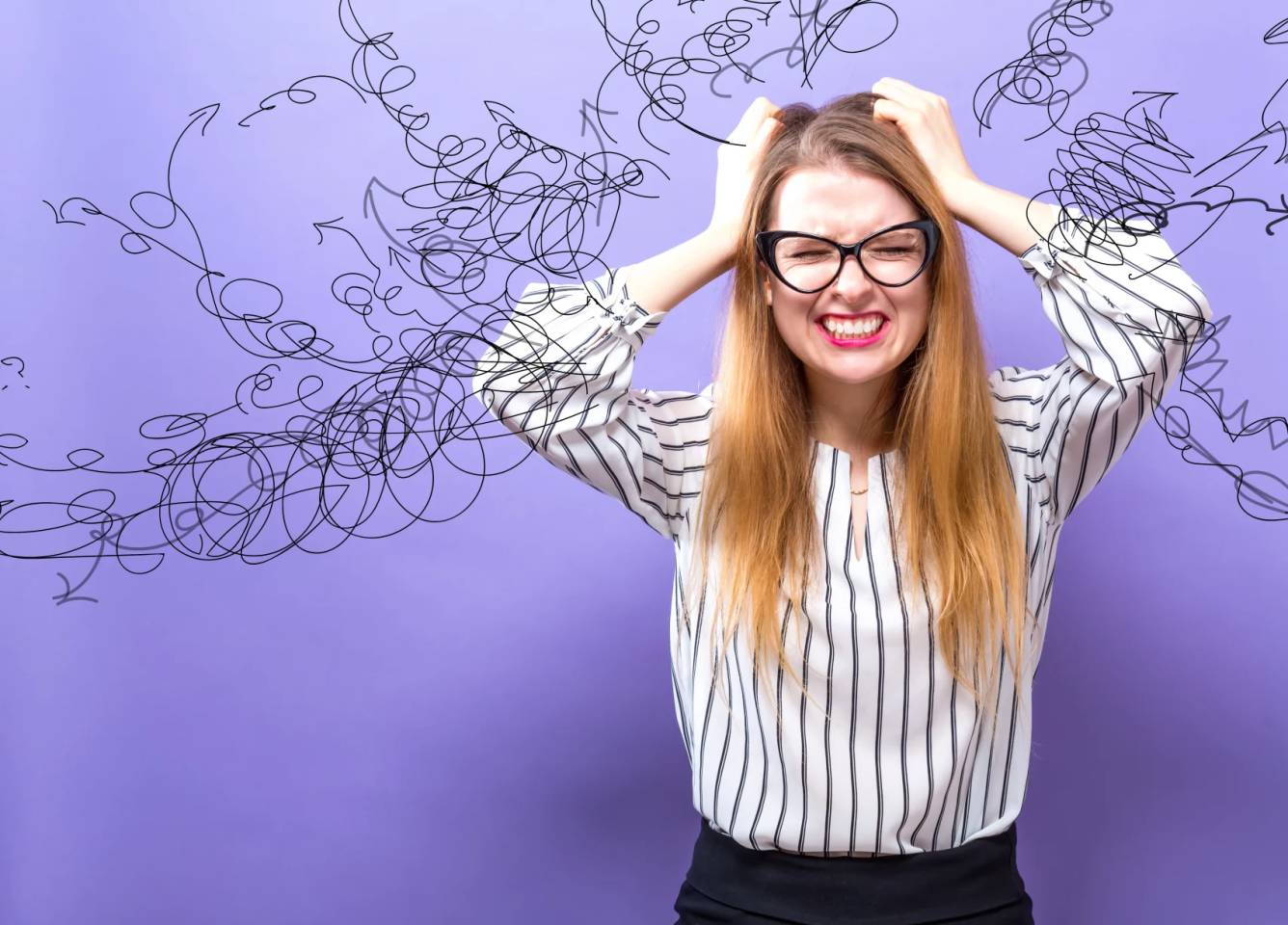 frustrated woman on purple background