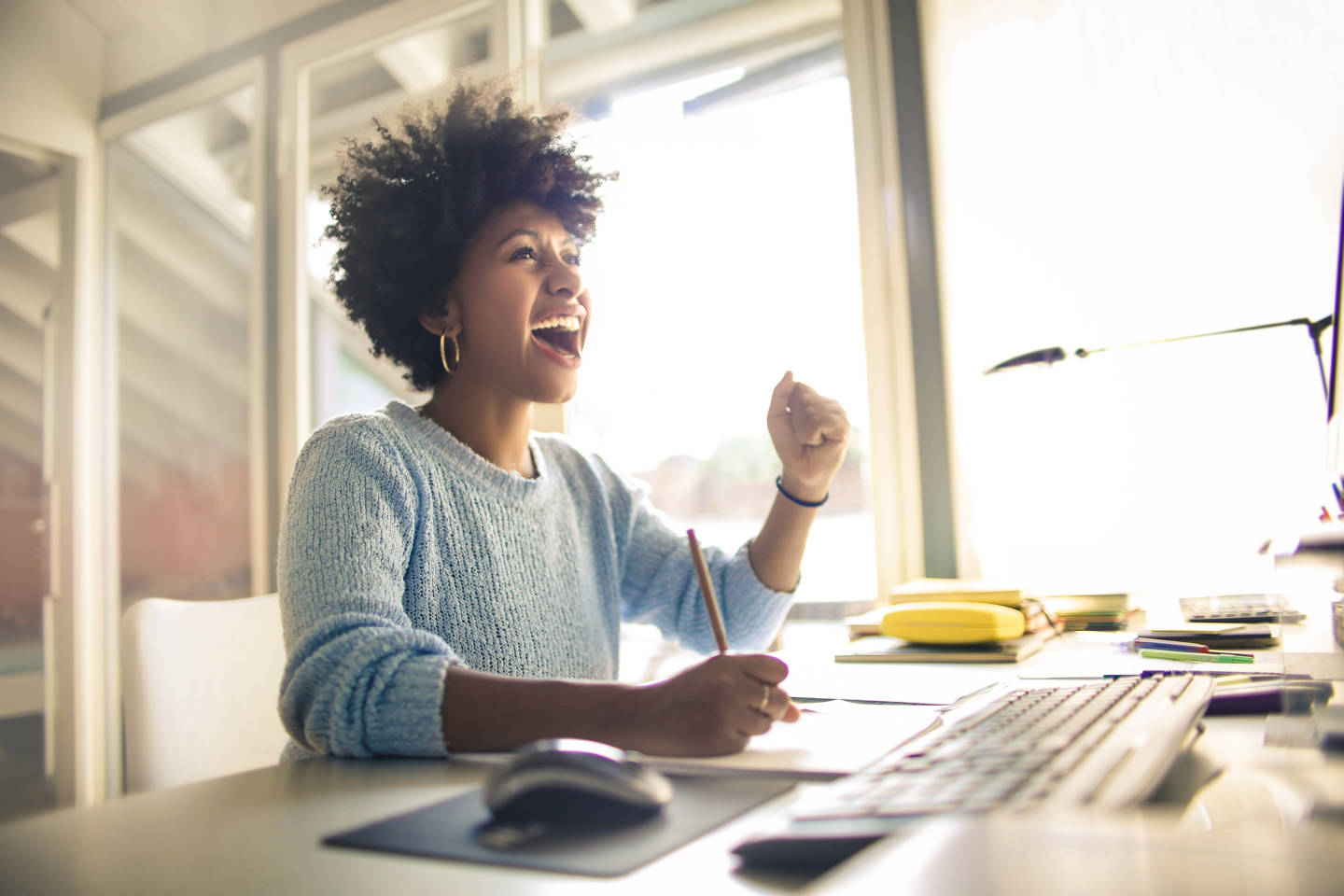 woman celebrating a success
