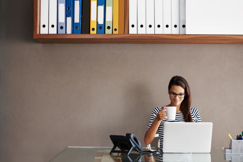 small business owner sitting at desk